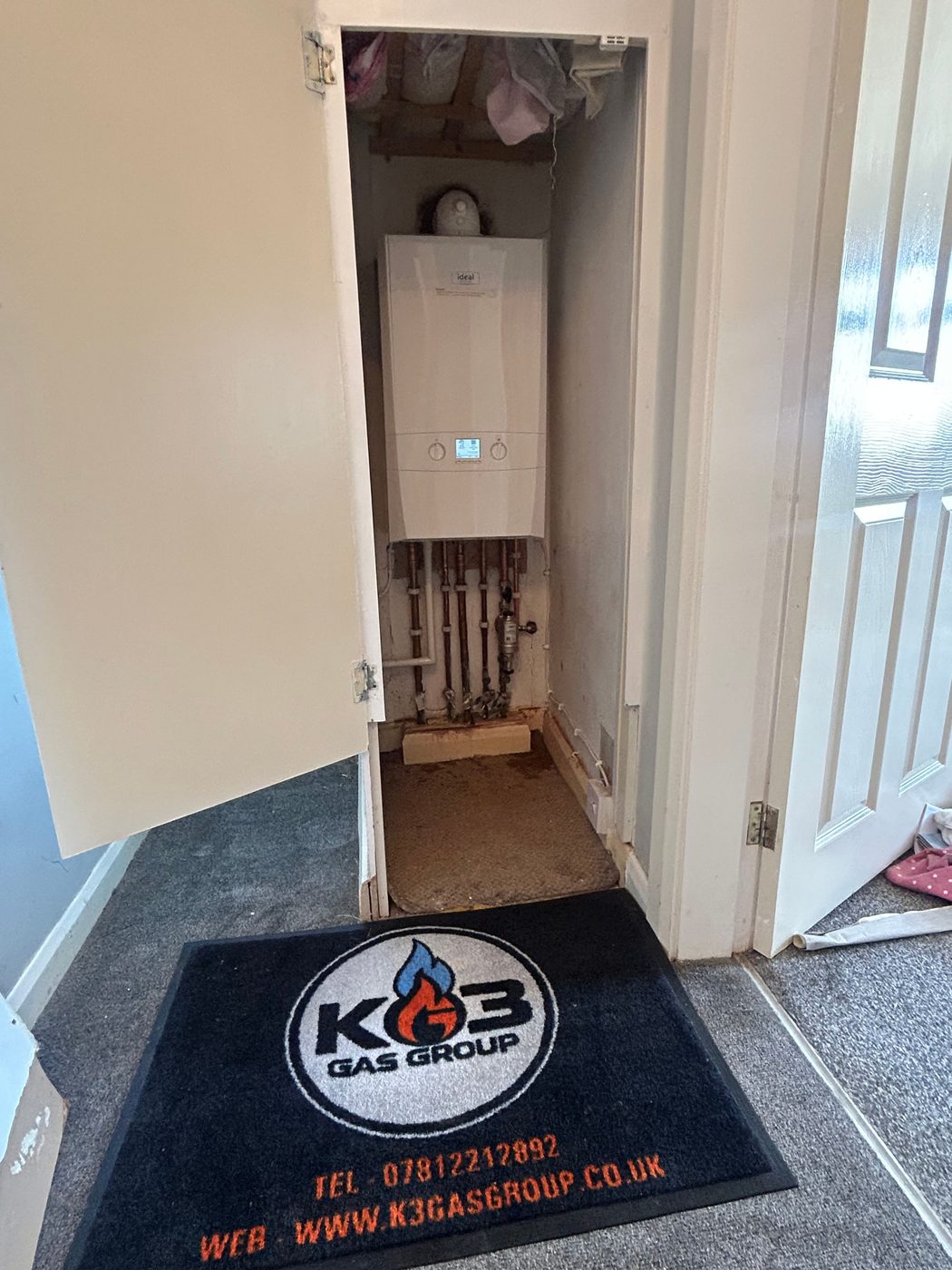 K3 Gas Group branded mat laid down at a customer's door to keep the job tidy