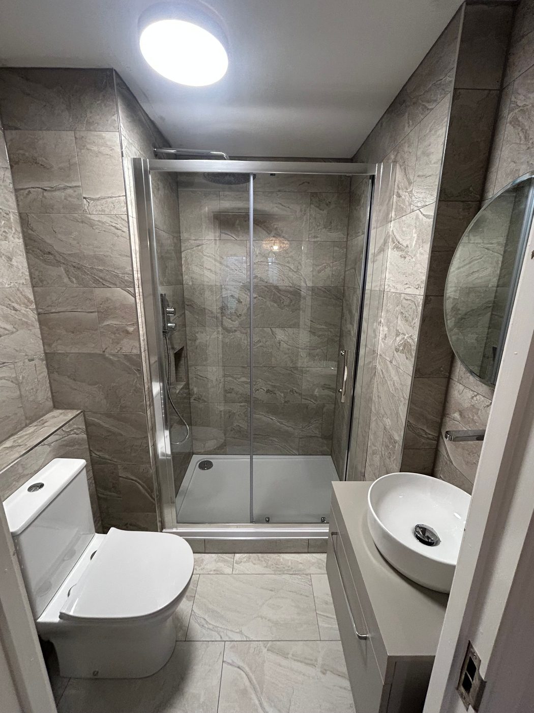Full bathroom refurbishment with walk-in shower by K3 Gas Group